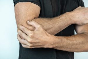 Male with Golfers Elbow